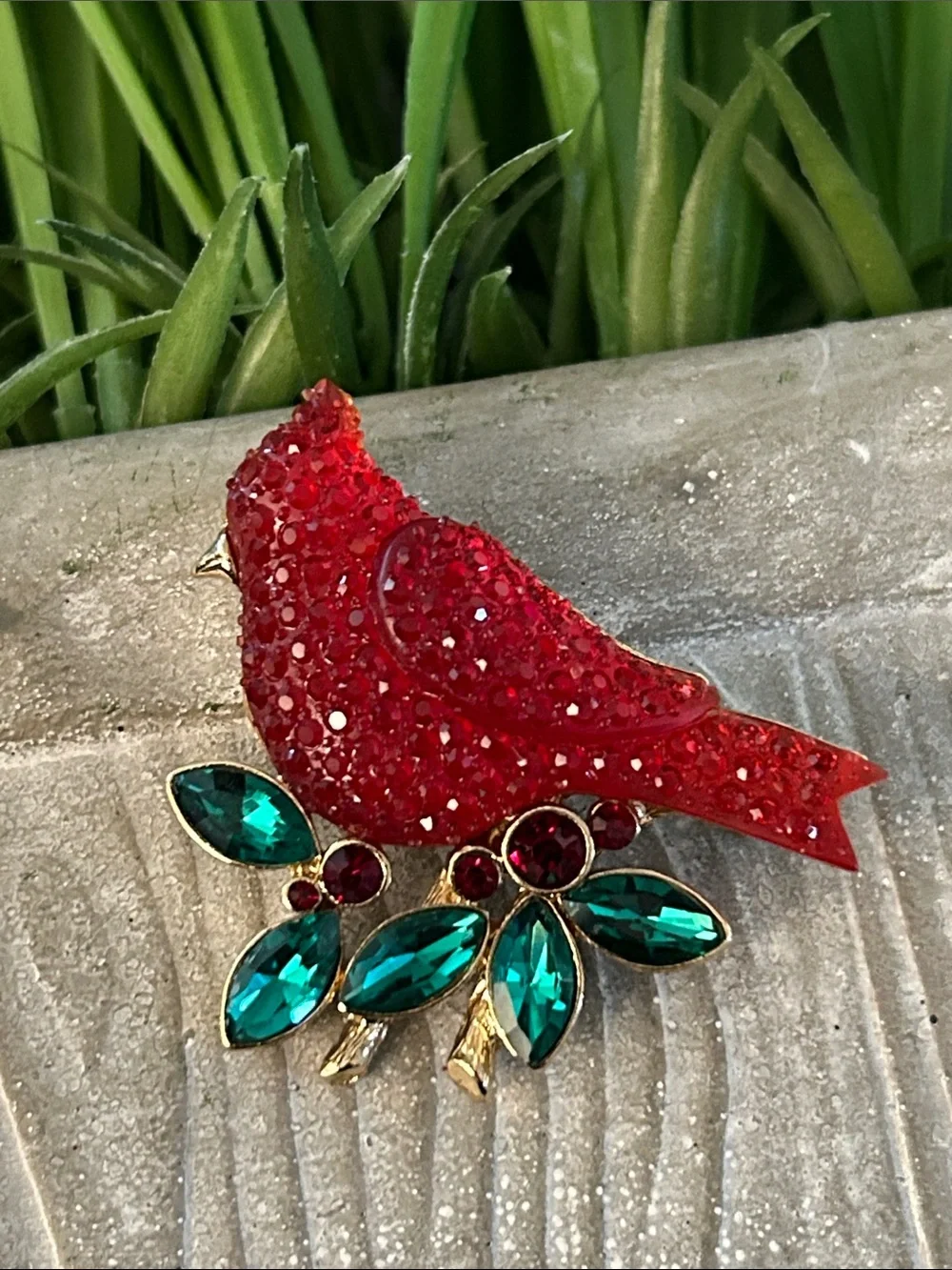 Red Cardinal Crystal Brooch with Emerald Green leaf Accents in goldtone branch